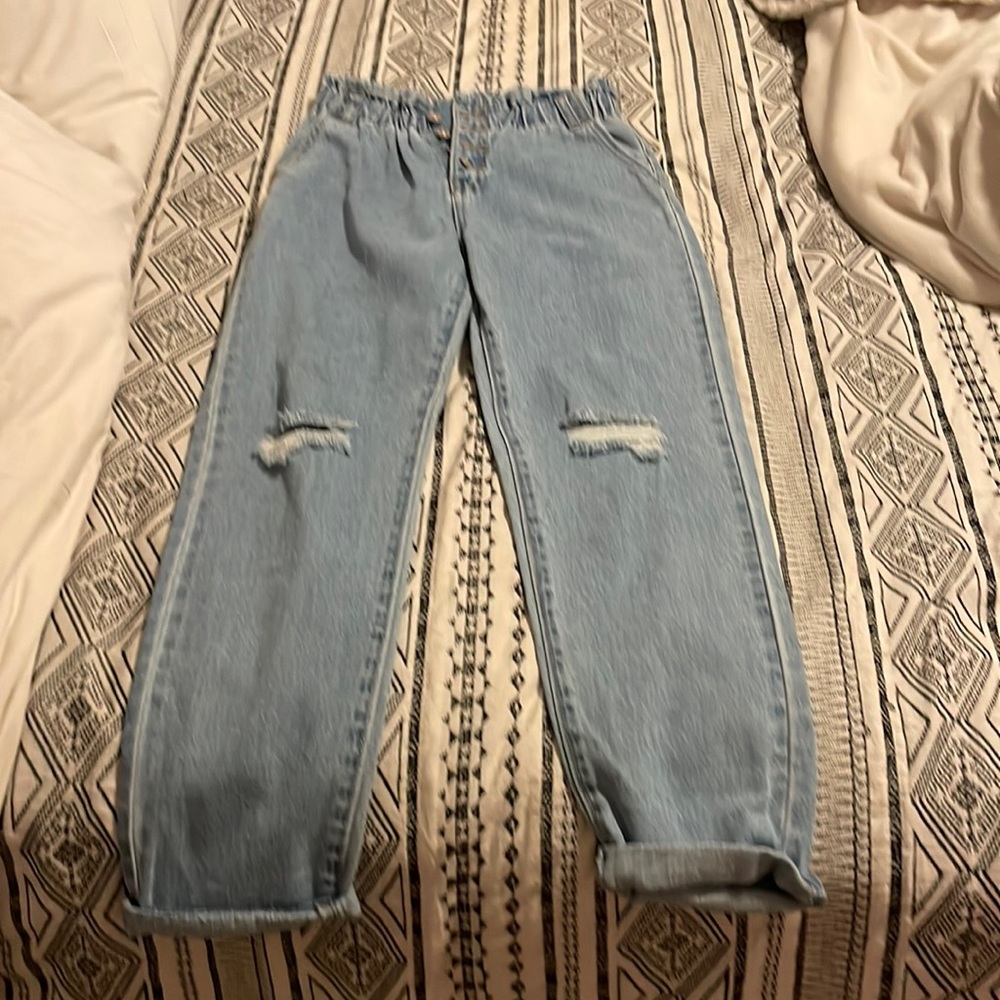 Baggy jeans with two little rips on knee both sides
